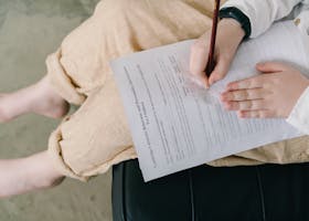 Child Filling Questionnaire in with Pencil